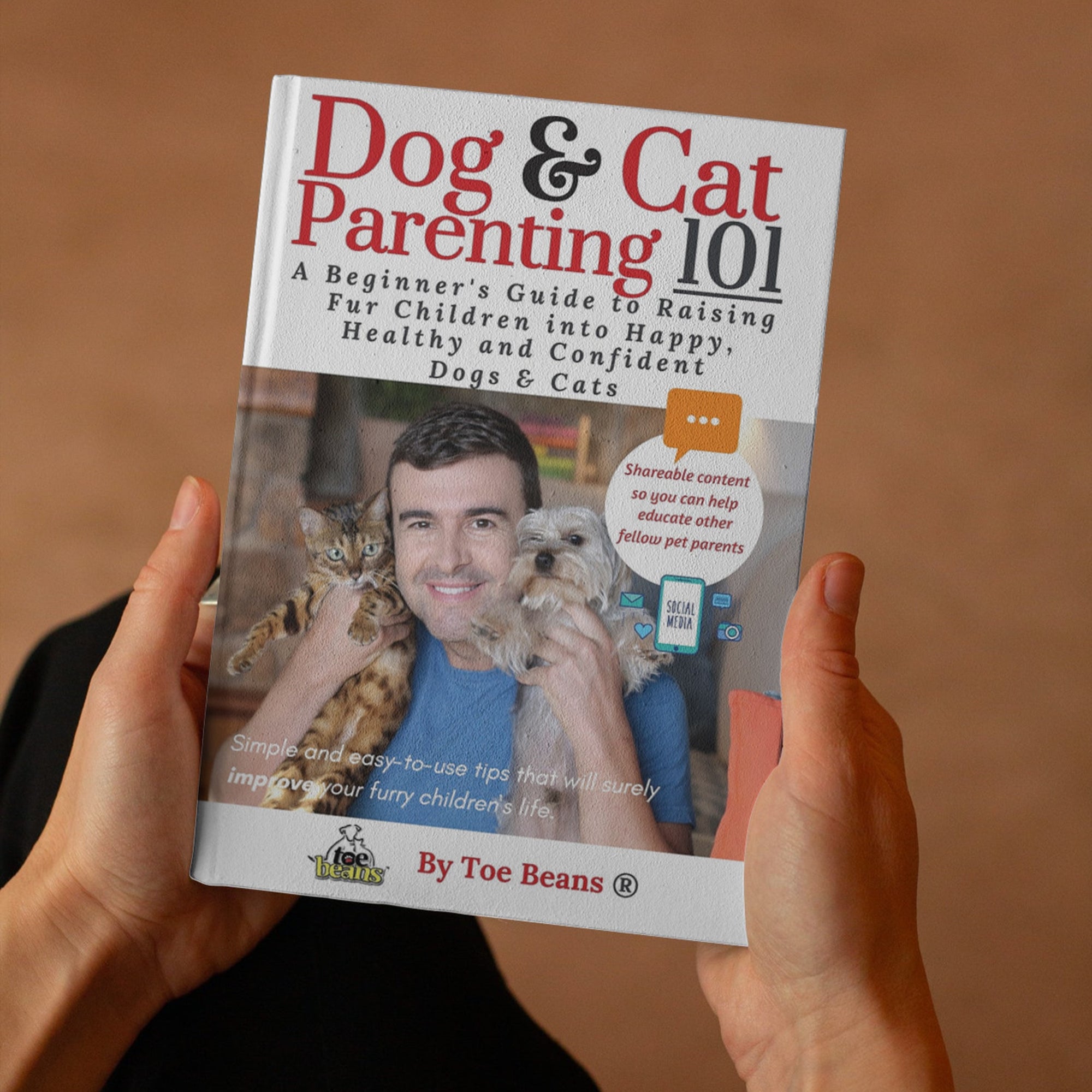 Person Holding Dog and Cat Parenting 101 pet Book by Toe Beans®