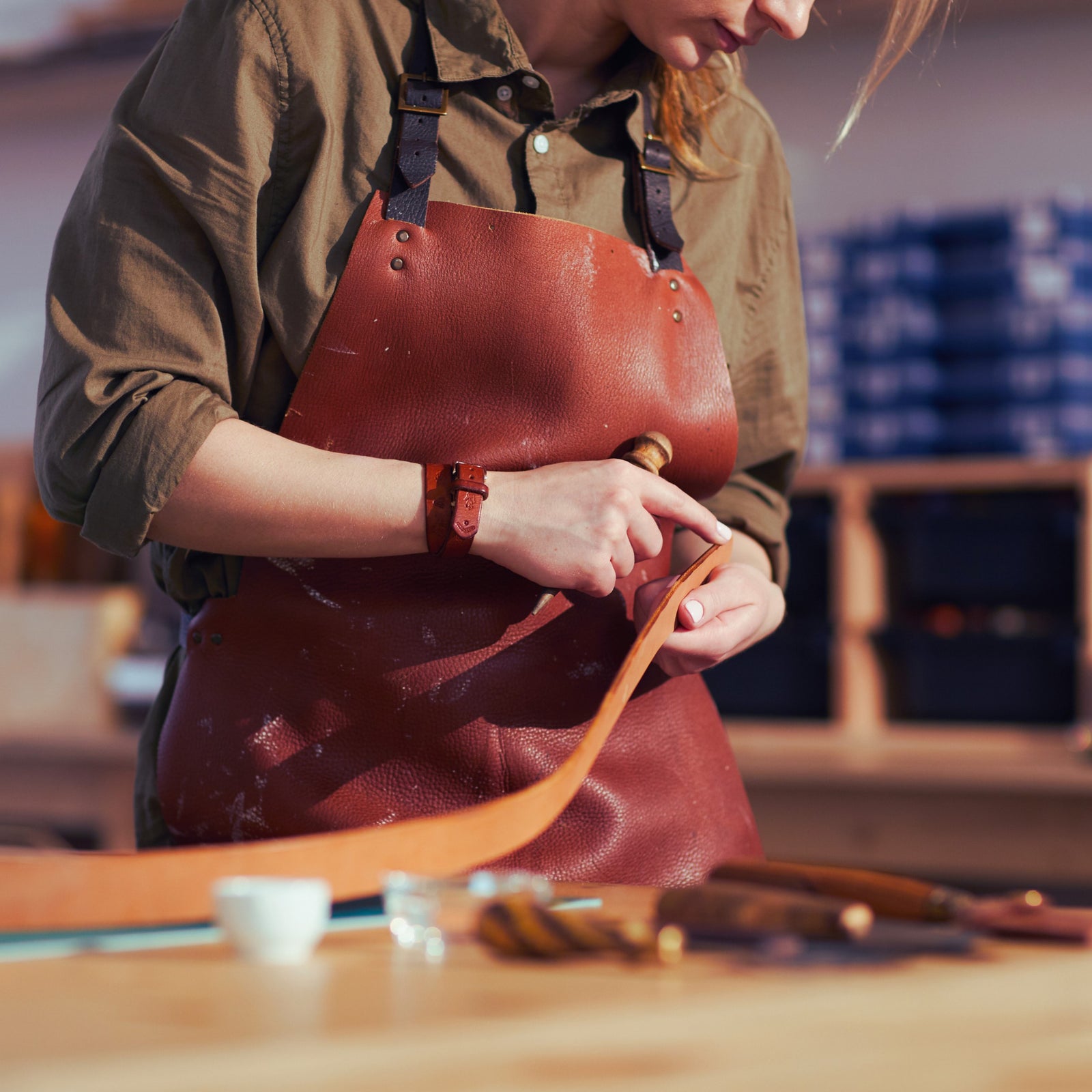 leather worker by toe beans