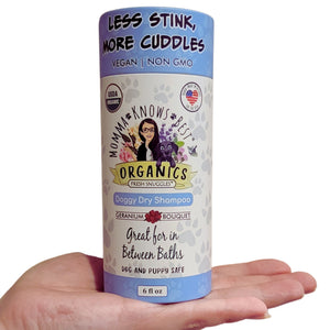 A hand holding a dog dry shampoo by Momma Knows Best_2