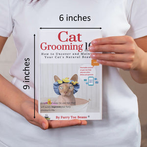 A person holding cat grooming cat book by toe beans