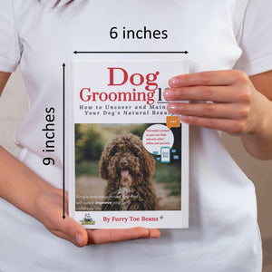A person holding dog grooming dog book by toe beans